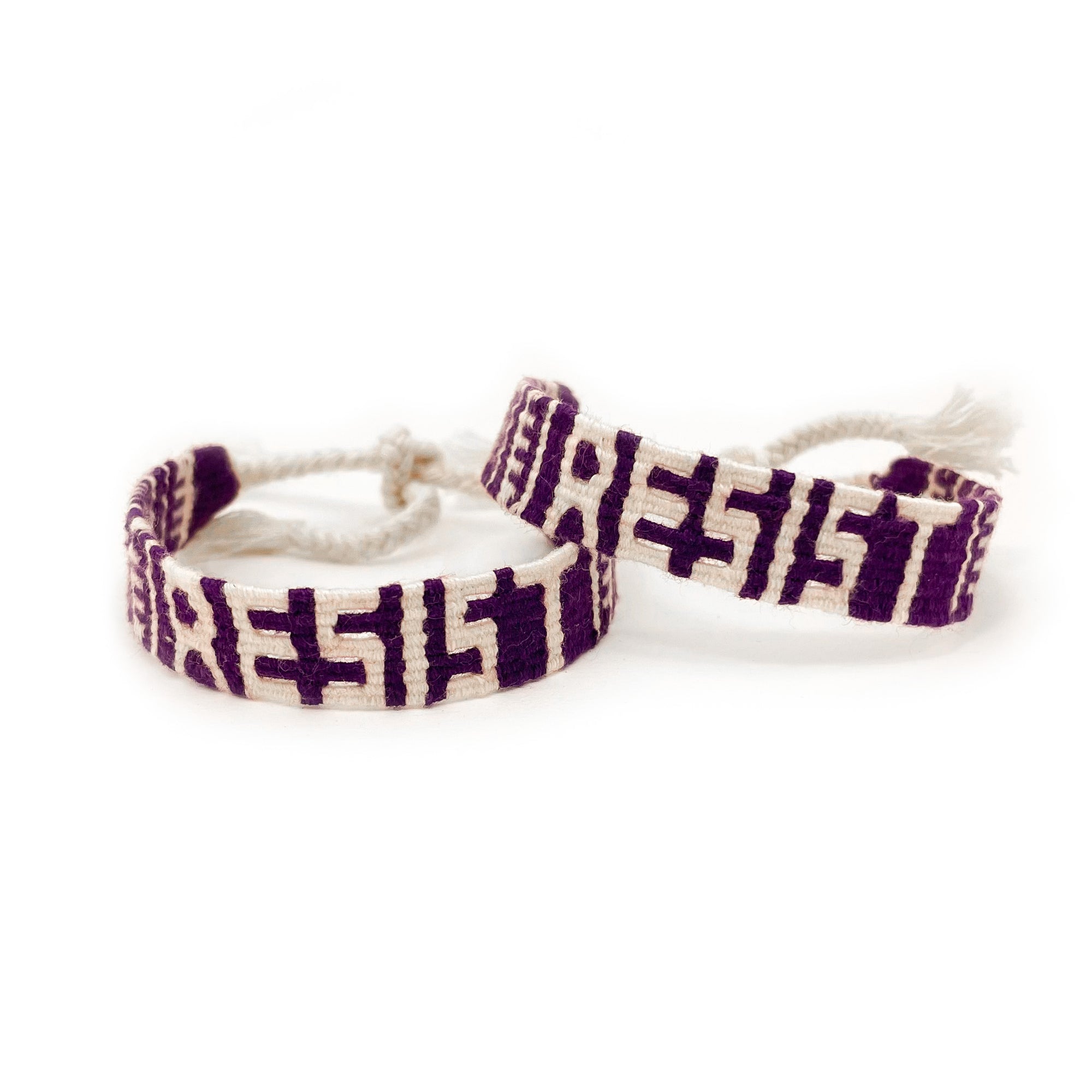 RESIST Bracelet with white lettering on purple background